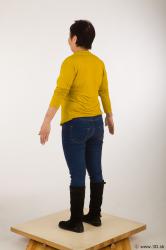 Whole body yellow sweater blue jeans black shoes of Gwendolyn